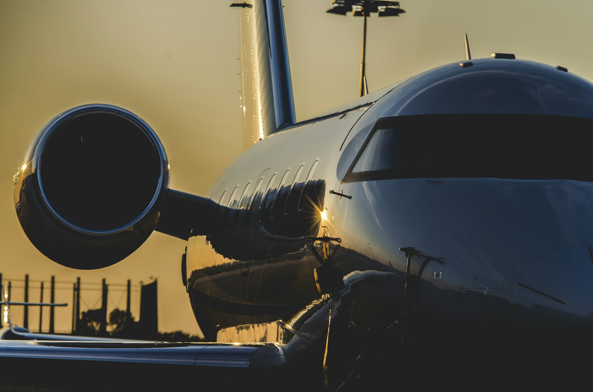 Close-up of a business jet engine nacelle at golden hour